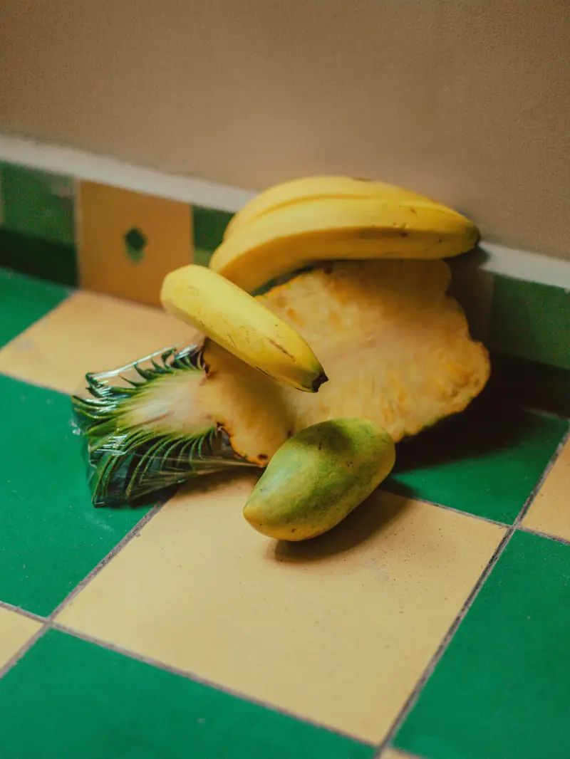 Bananas on green and cream checkered tile